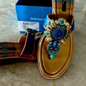 Woman’s sandals. 2 inch wedge heel. turquoise center stone surrounded by gold.